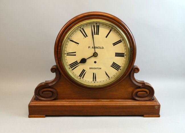 Late 19th Century mahogany mantle clock with black