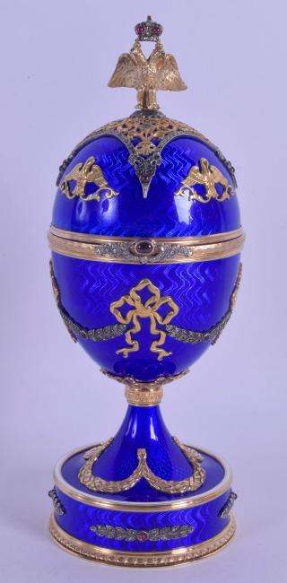 A FINE RUSSIAN SILVER GILT AND BLUE ENAMEL MANTEL CLOCK