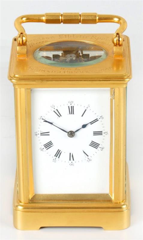 A late 19th century brass carriage clock.