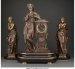 A Three-Piece Patinated Bronze Clock Garniture a