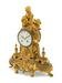 A French Gilt Bronze Figural Mantel Clock