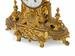 A French Gilt Bronze Figural Mantel Clock