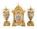 A French Gilt Bronze and Painted Porcelain Clock