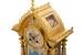 A French Gilt Bronze and Painted Porcelain Clock