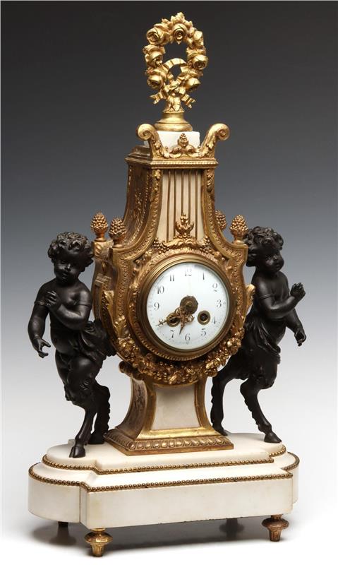 A 19TH C. PARCEL GILT BRONZE LYRE FORM CLOCK WITH PUTTI