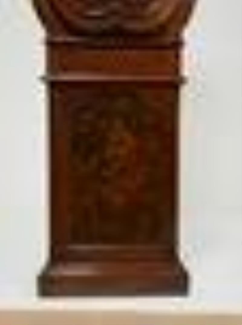 A Louis XV walnut and parquetry tall case clock