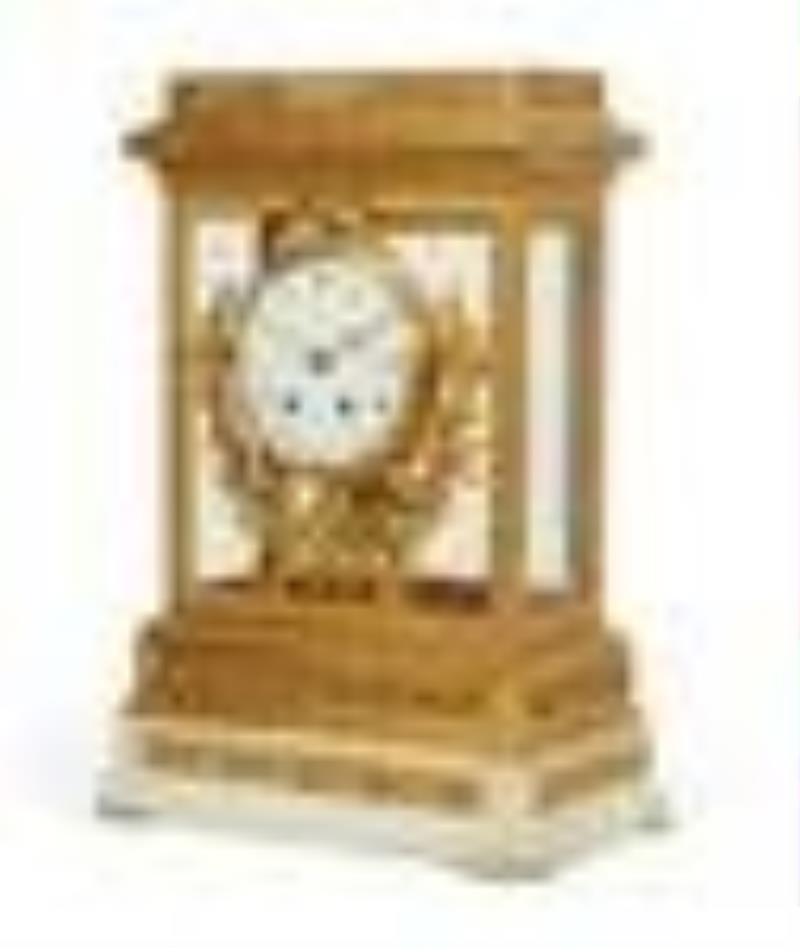 A Louis XVI style bronze & marble mantel clock