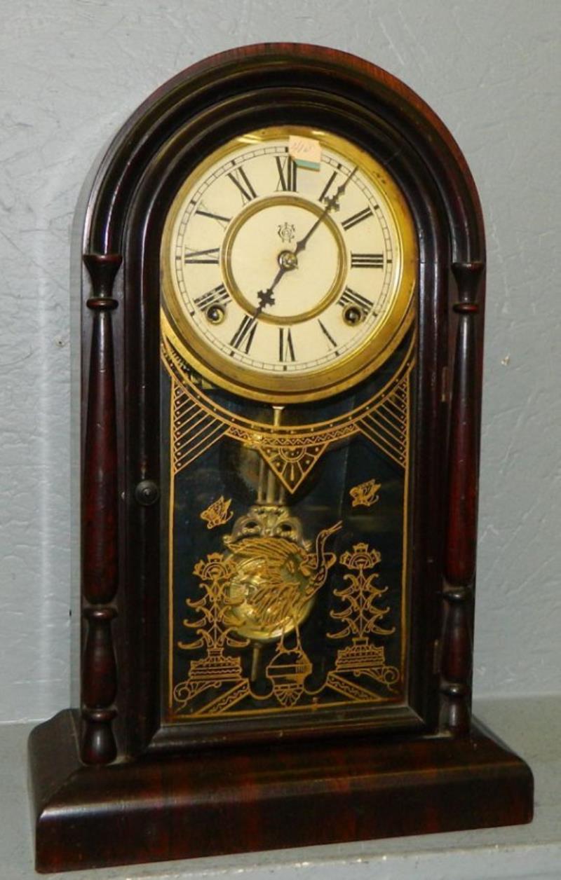 Waterbury 8 day rosewood Gothic style clock .