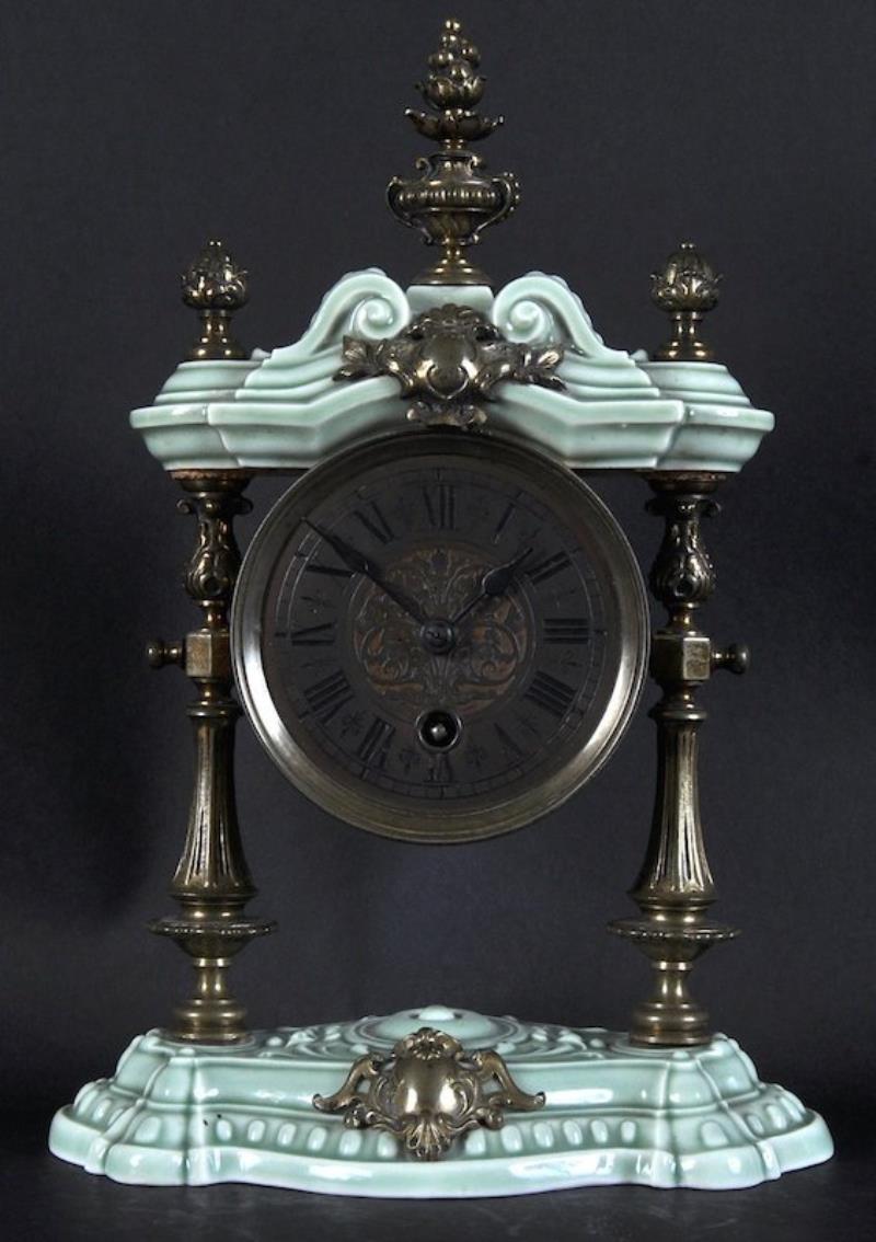 A CONTINENTAL PORCELAIN CLOCK ÂLENZKIRCHÂ with urn