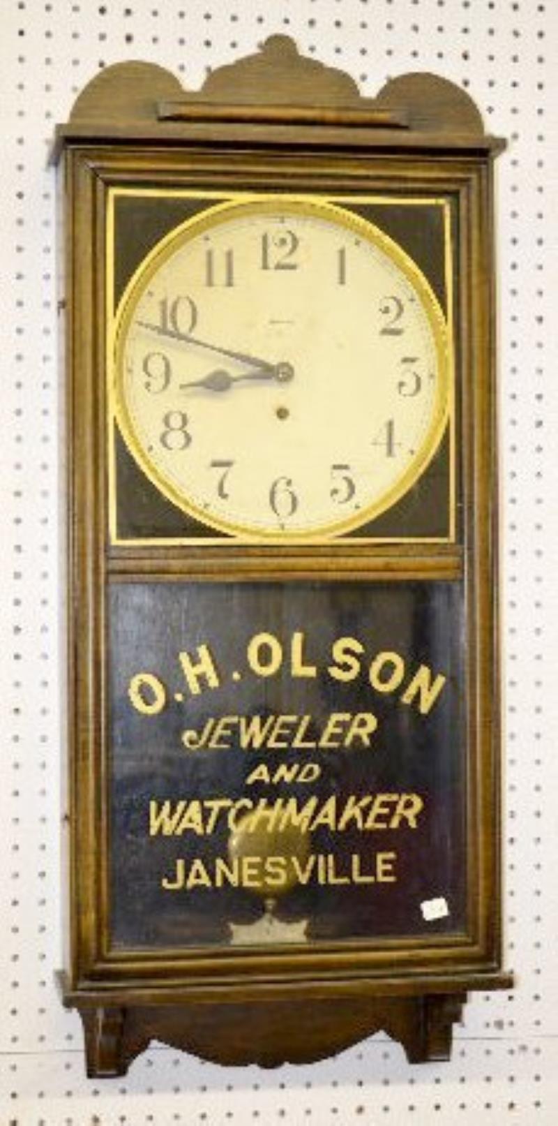 Waterbury “Pelican” Oak Advertising Wall Clock