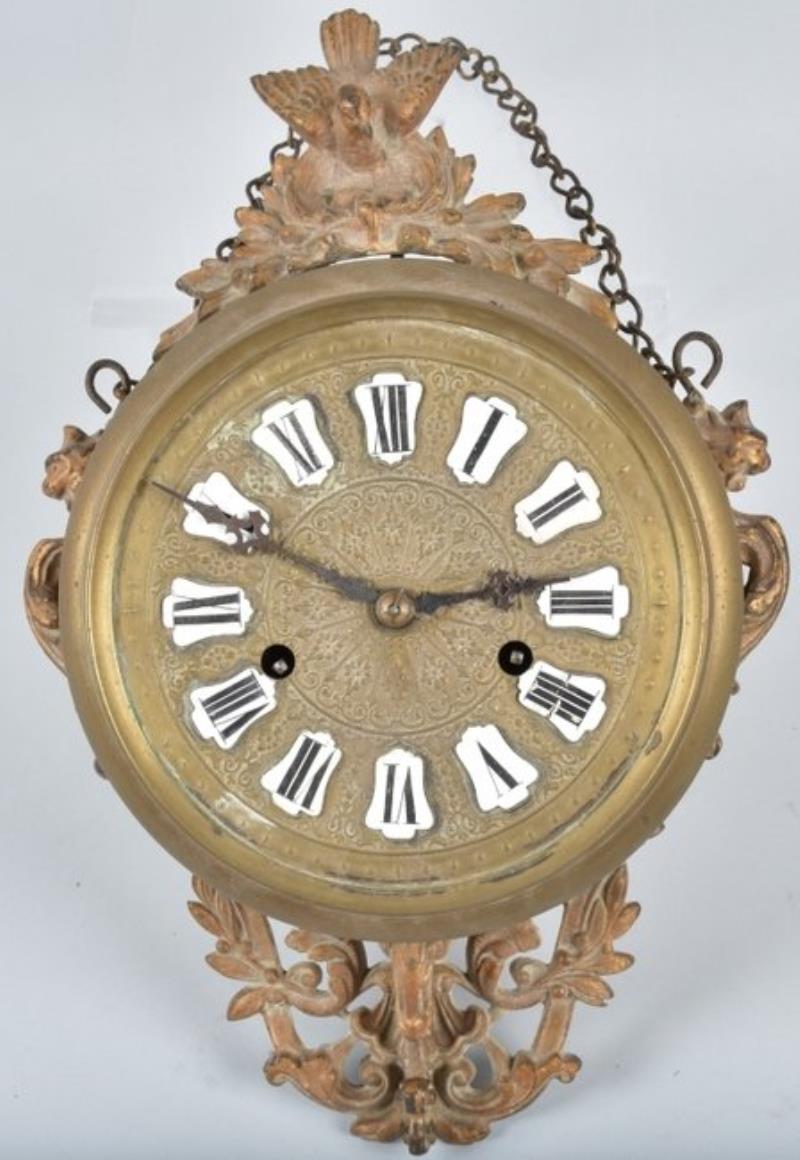 EARLY BRASS AND CAST IRON WALL CLOCK