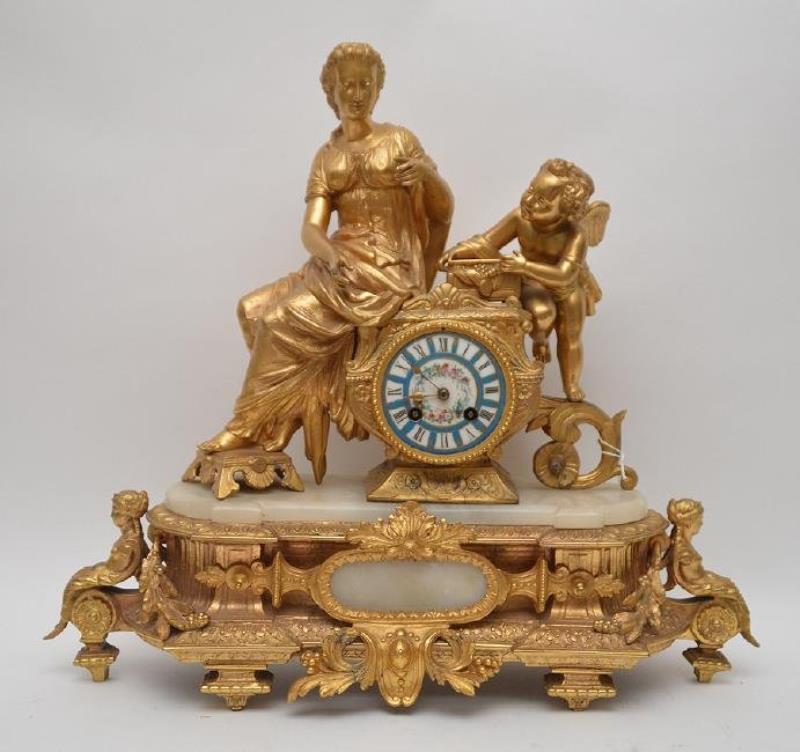 French Gilt Metal Figural Clock with time and strike