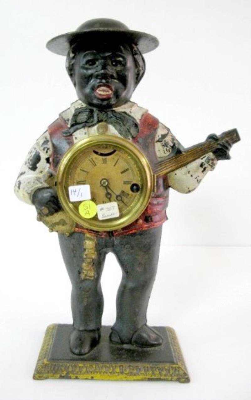 Cast Iron Sambo Banjo Player Blinking Eye Clock