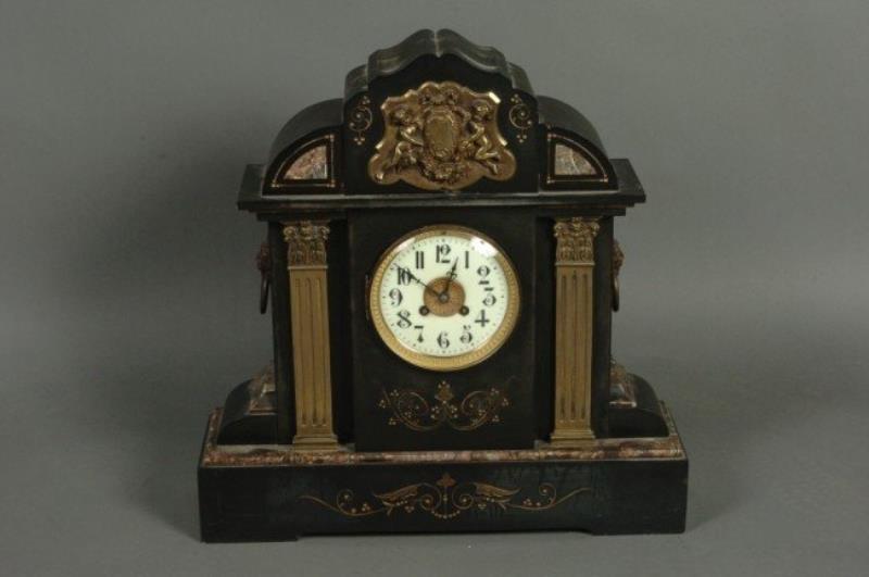 A BRONZE MOUNTED SLATE MANTEL CLOCK W/ JAPY FRERES