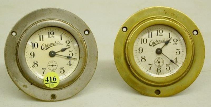 2 Antique Oldsmobile Automobile Clocks