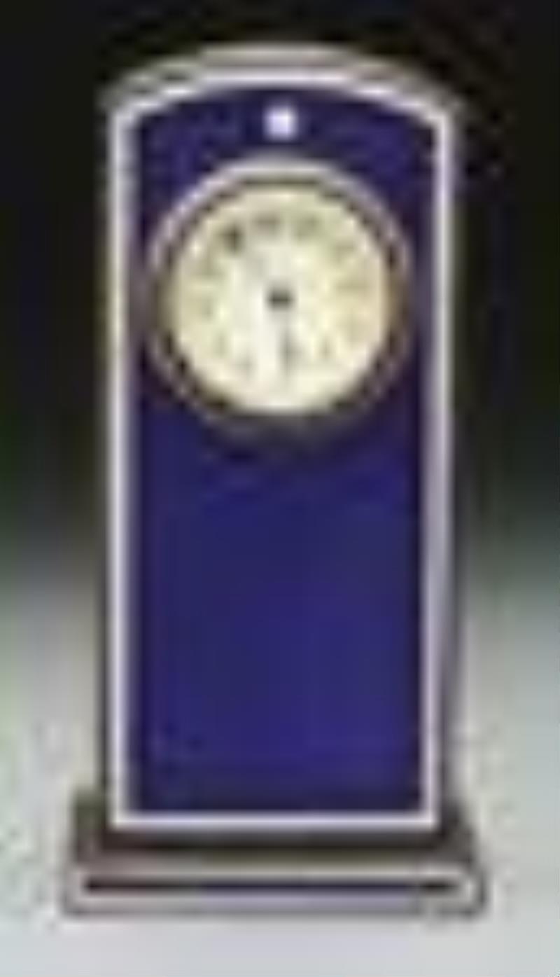 SMALL ENAMELED CLOCK.