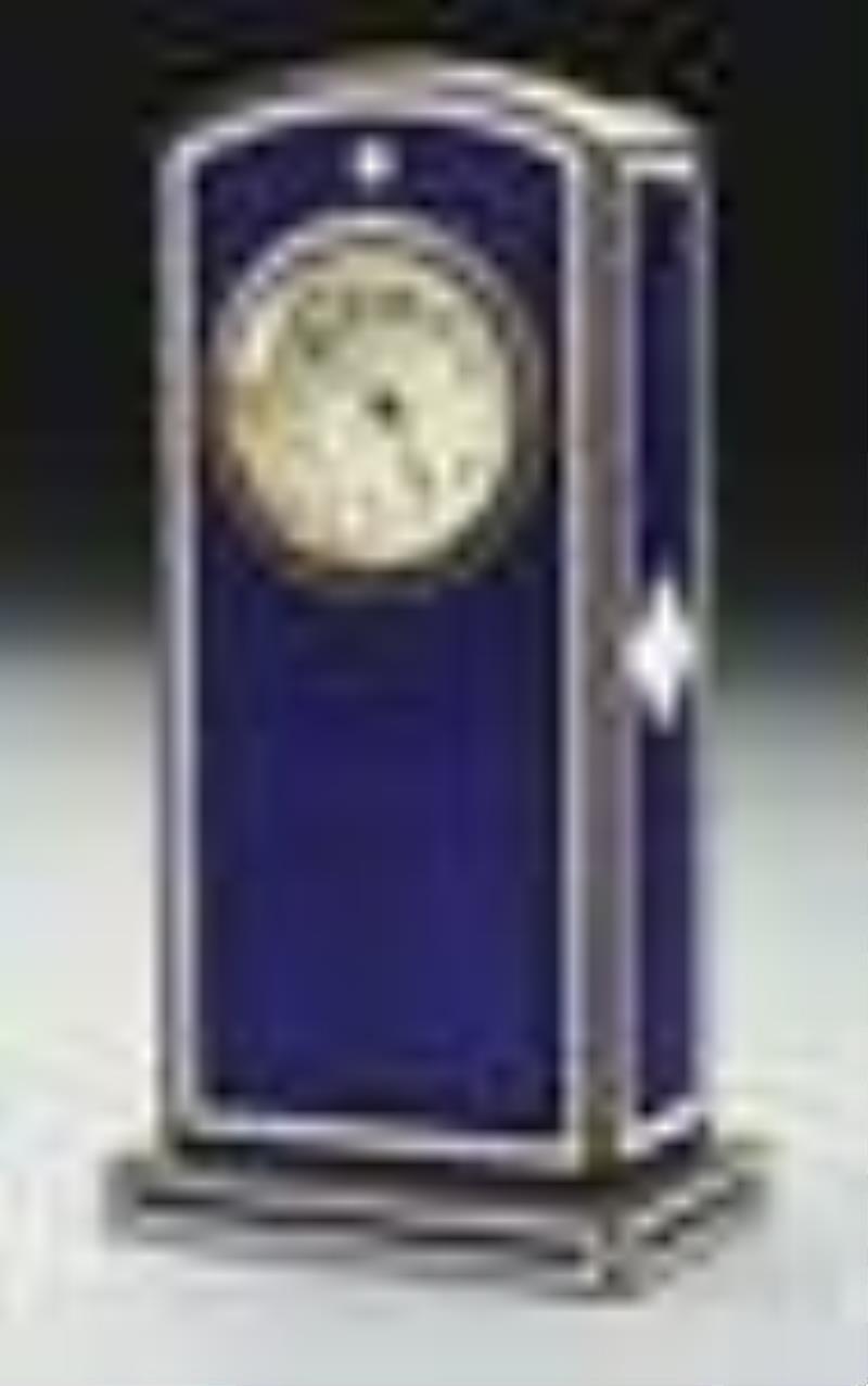 SMALL ENAMELED CLOCK.