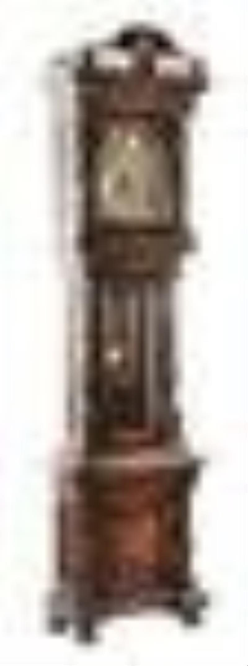 CARVED WALNUT TALL CASE CLOCK IN THE STYLE OF OTTO