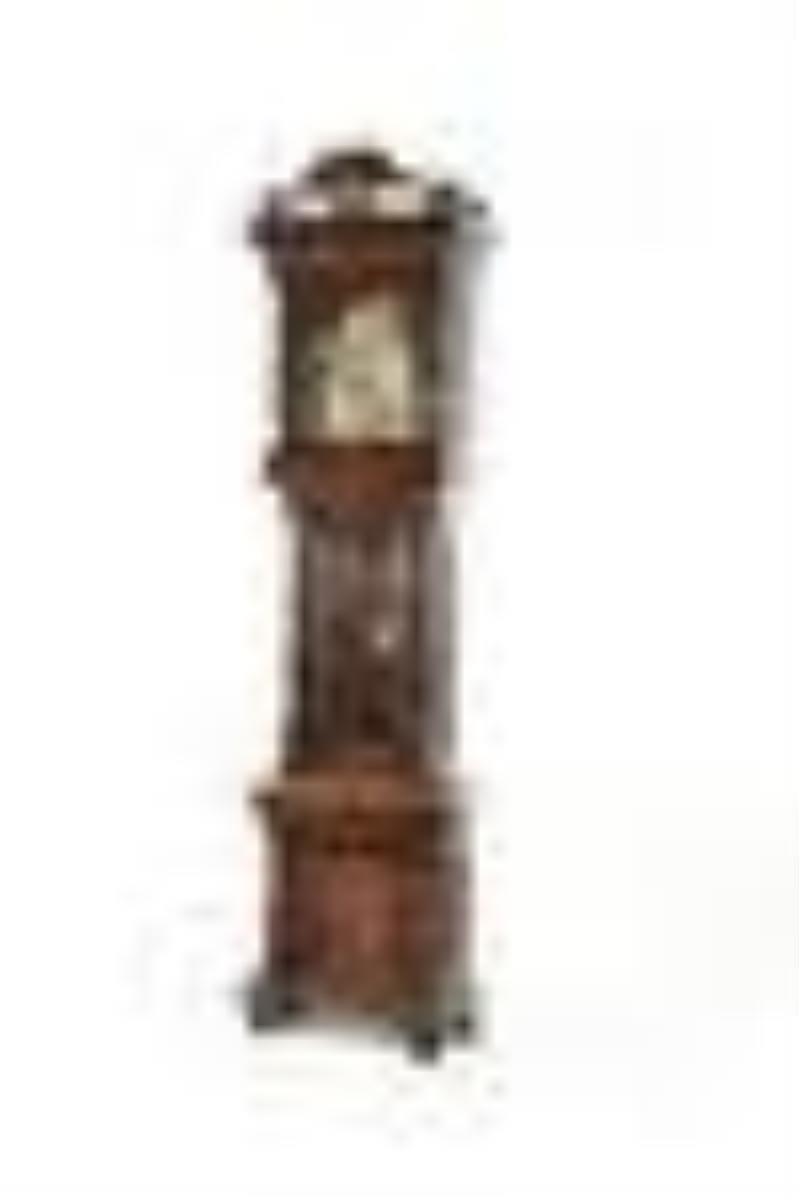 CARVED WALNUT TALL CASE CLOCK IN THE STYLE OF OTTO