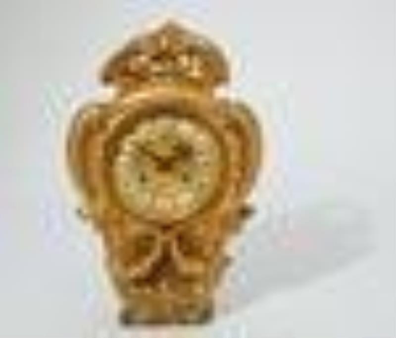 A French gilt bronze cartel clock, circa 1900