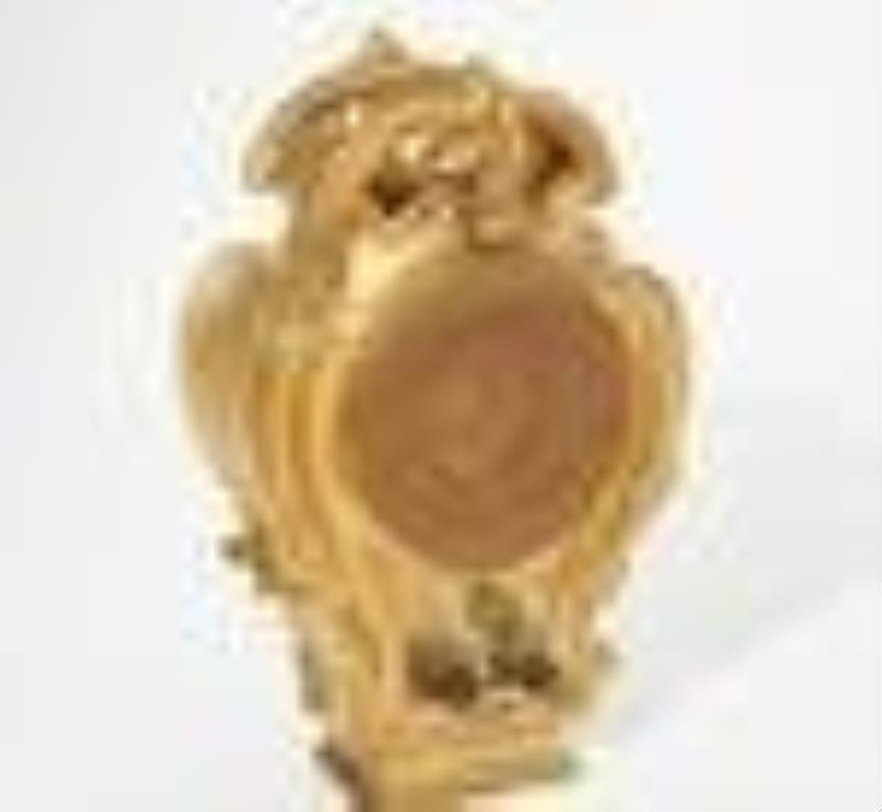 A French gilt bronze cartel clock, circa 1900