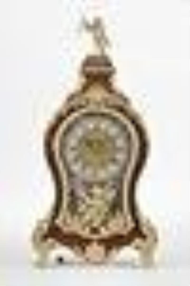 An 18th century turtle shell veneered musical clock