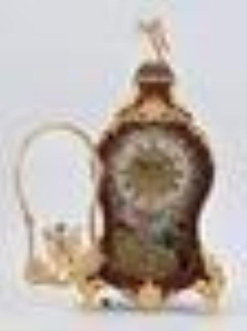 An 18th century turtle shell veneered musical clock