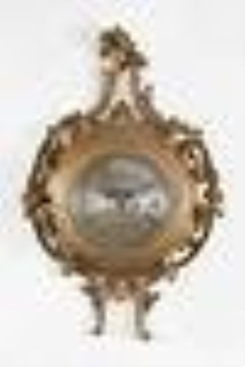 An 18th century English cartel clock signed Saml. Davy