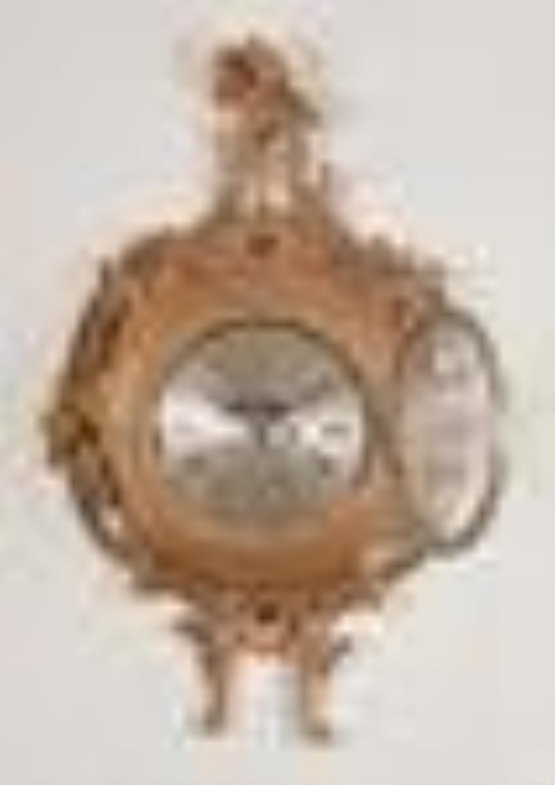 An 18th century English cartel clock signed Saml. Davy