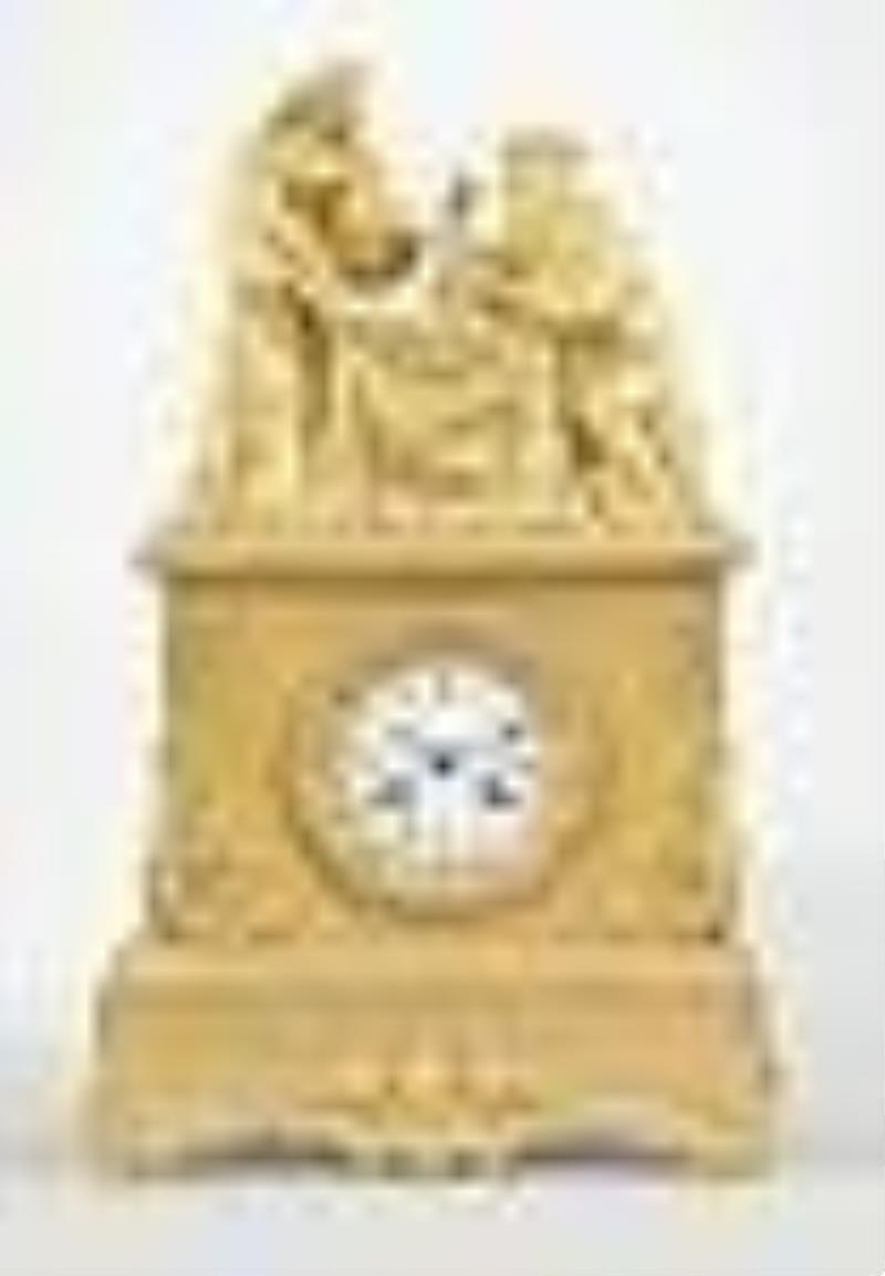 A mid 19th century French ormolu figural mantel clock