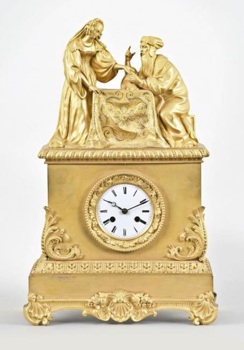 A mid 19th century French ormolu figural mantel clock