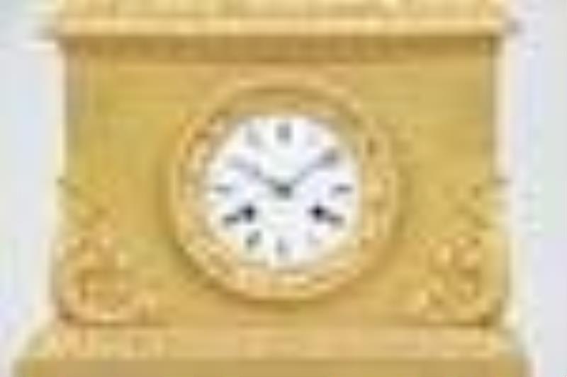 A mid 19th century French ormolu figural mantel clock