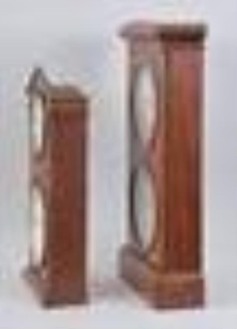 Seth Thomas and Ithaca double dial calendar clocks.