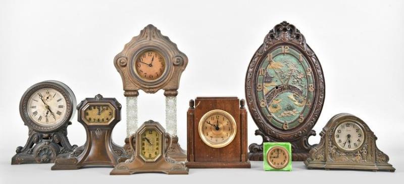 Nine clocks including Lux, Seth Thomas, Sangamo and