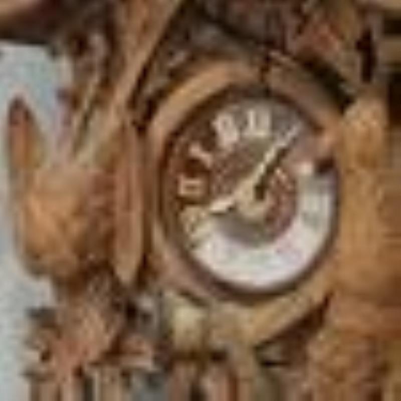 Large Black Forest style carved cuckoo clock