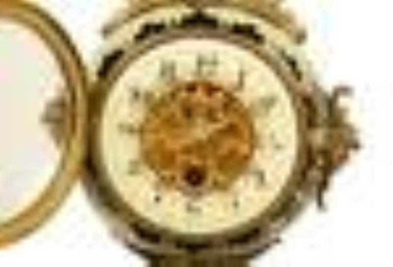 A French Gilt Bronze and Glazed Pottery Clock Height 19