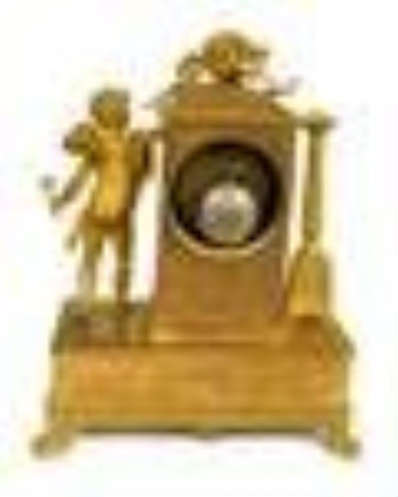 A French Empire Gilt Bronze Mantle Clock Homage a La