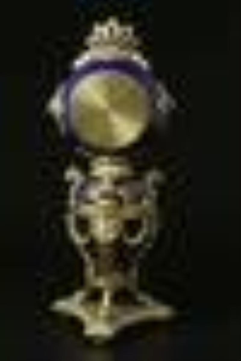 Dore bronze and purple porcelain clock