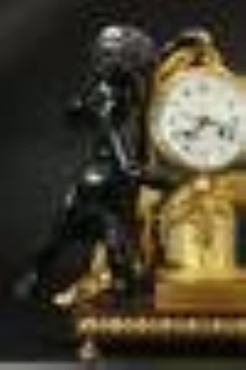 Large Dore bronze and dark patina cupid clock