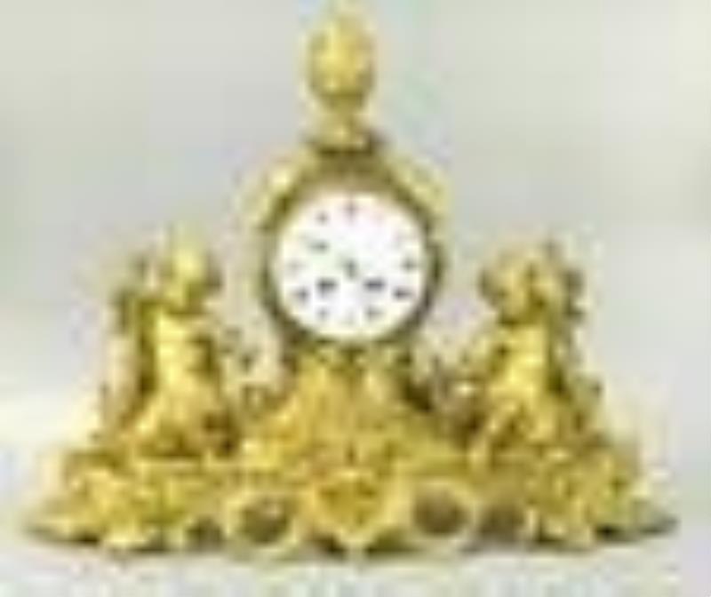 Dore bronze clock with cupids