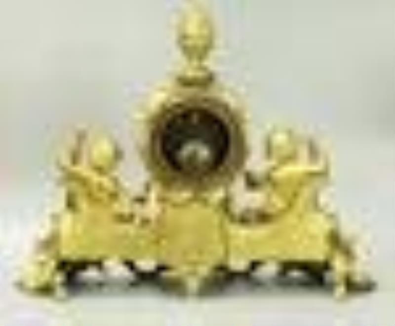 Dore bronze clock with cupids