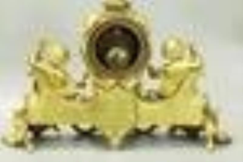 Dore bronze clock with cupids