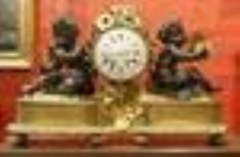 Early 19th century Dore bronze and dark patina clock