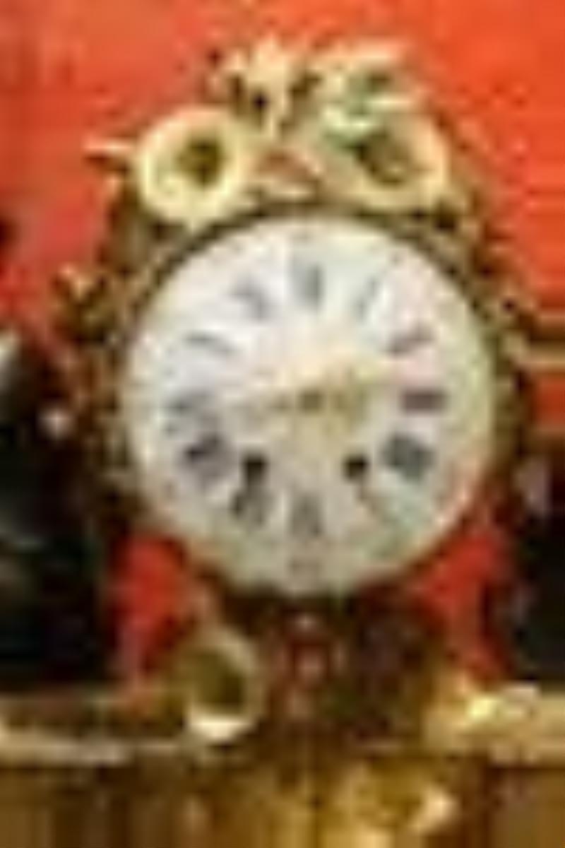 Early 19th century Dore bronze and dark patina clock