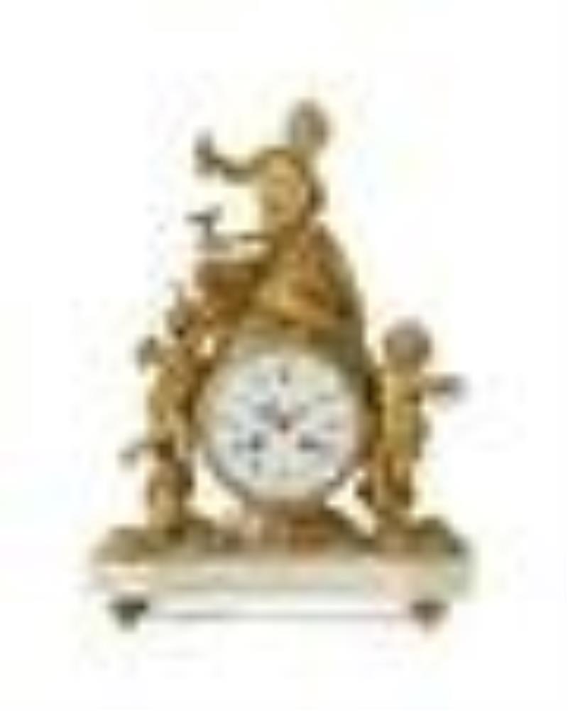 A French figural gilt-bronze table clock