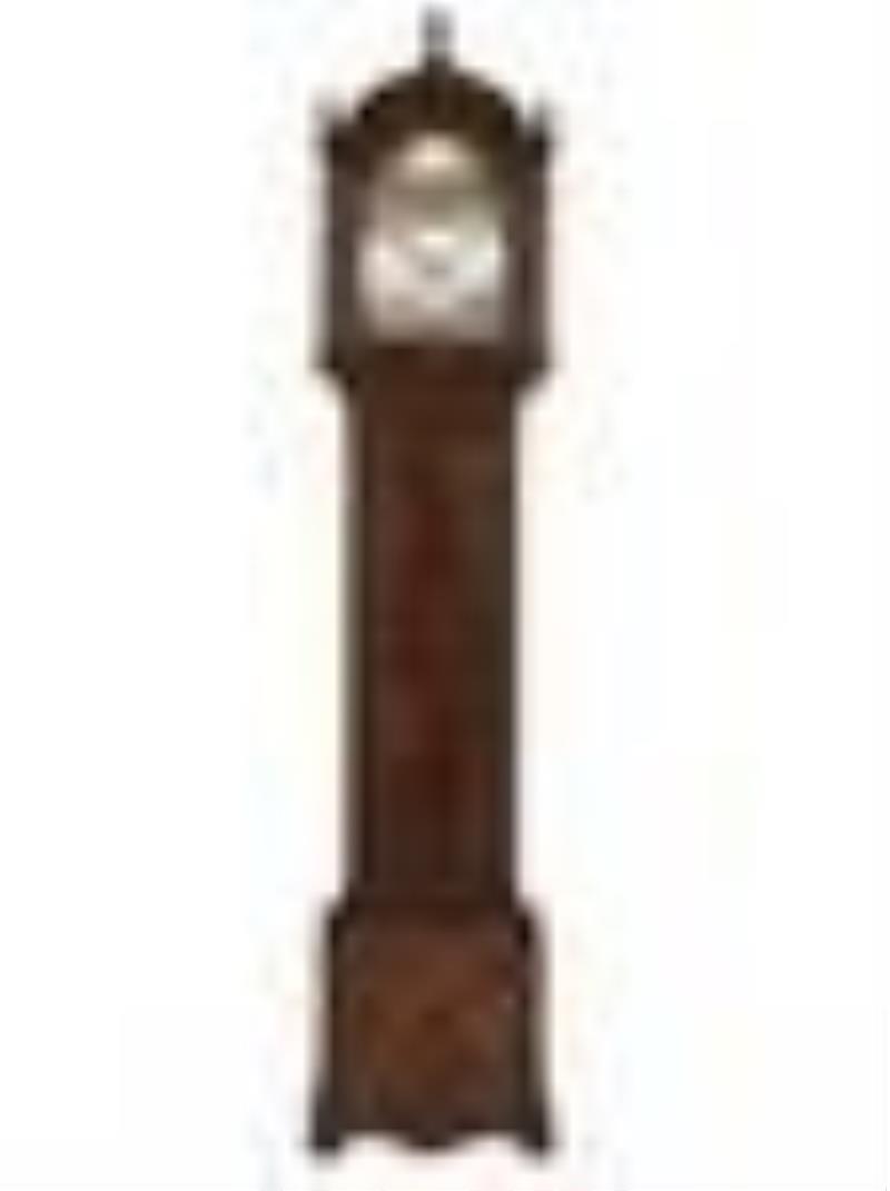 An English Tall Case Clock with Finely Carved Oak Case