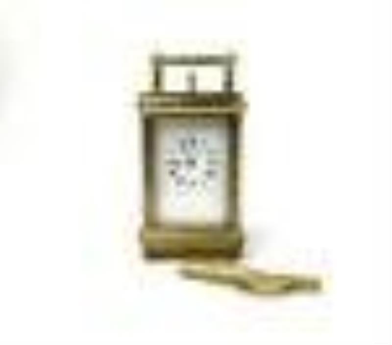 A Marcus & Co. Gilt 5 Minute Repeater Carriage Clock