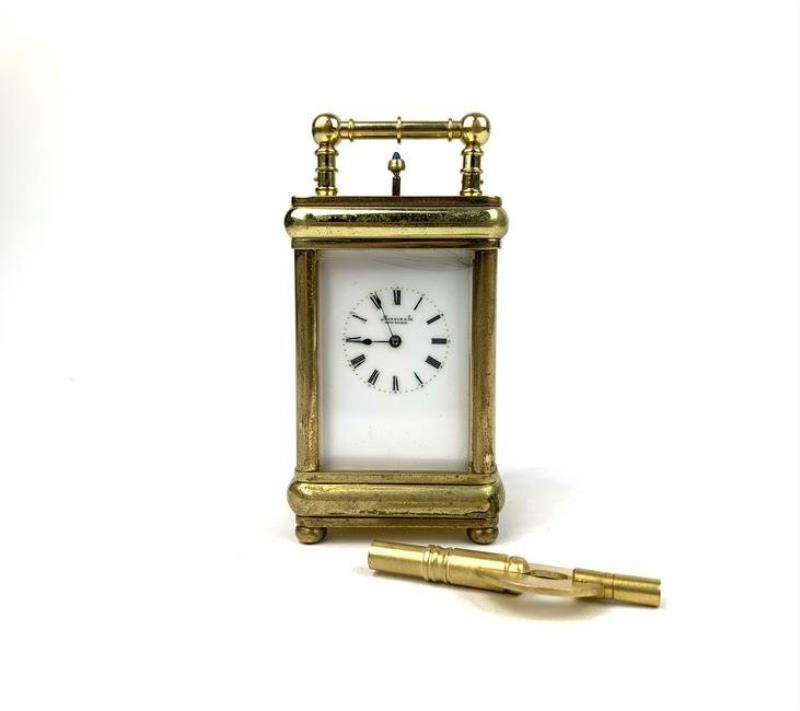 A Marcus & Co. Gilt 5 Minute Repeater Carriage Clock