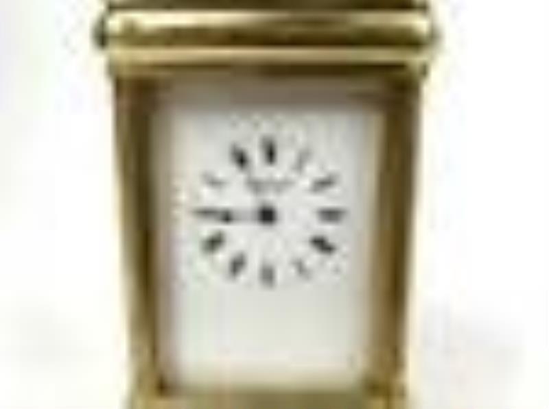 A Marcus & Co. Gilt 5 Minute Repeater Carriage Clock