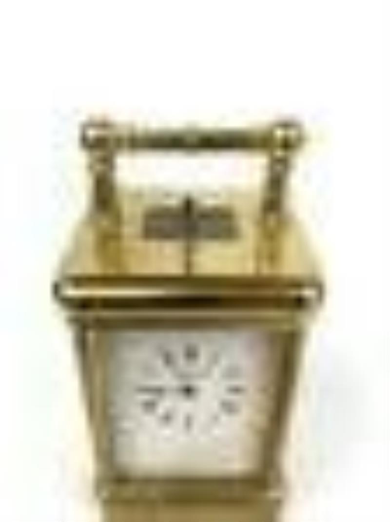 A Marcus & Co. Gilt 5 Minute Repeater Carriage Clock
